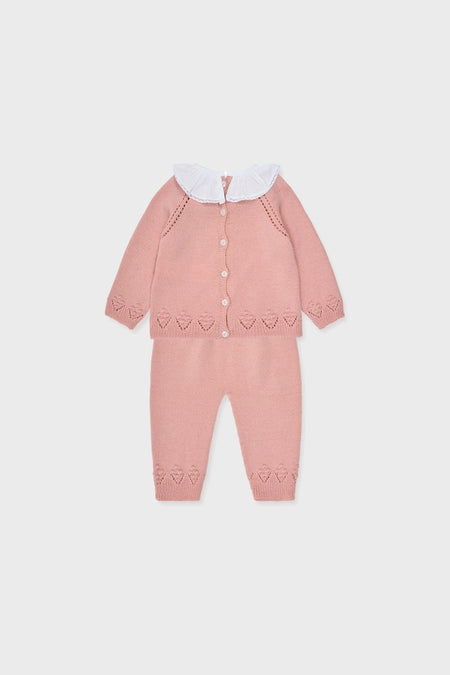 Dusty Pink Baya Merino Baby Girl Knitted Set: Effortlessly classic, this high-end two-piece features a ruffled collar cardigan and matching pants with heart details for fun, timeless charm.