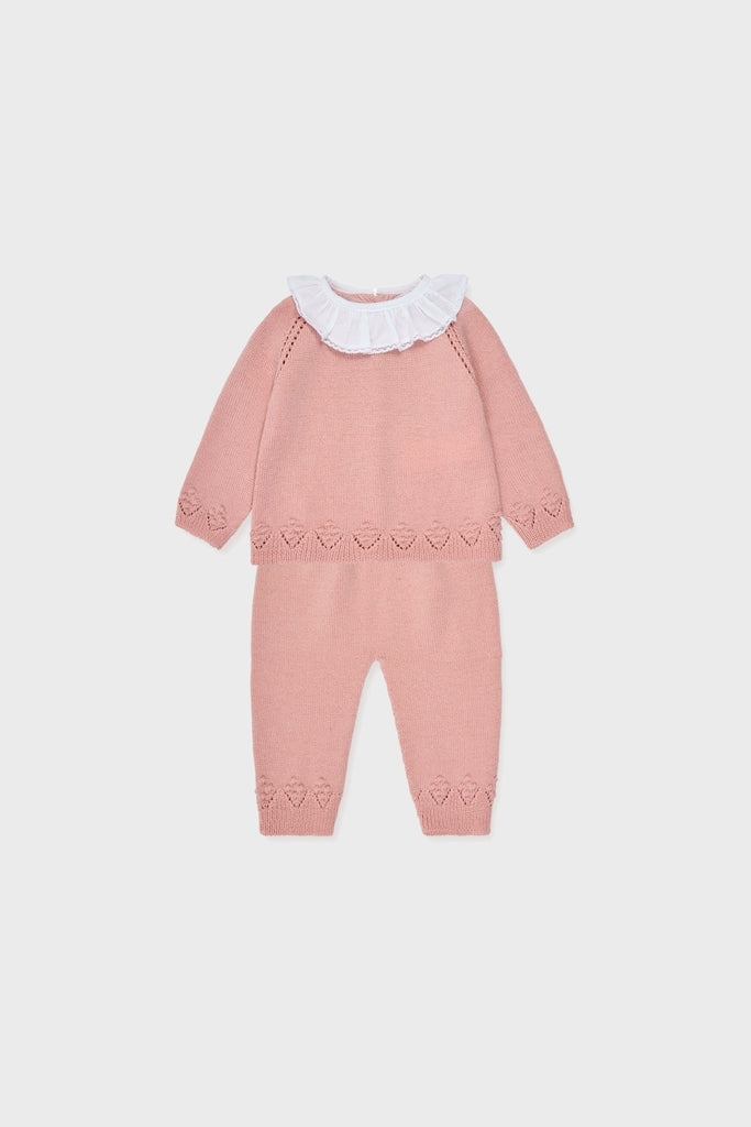 Dusty Pink Baya Merino Baby Girl Knitted Set: classic, high-end sweater with heart-lace trim, ruffled collar, and matching pants, offering effortless charm and fun for everyday wear.
