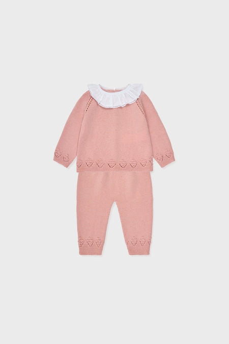 Dusty Pink Baya Merino Baby Girl Knitted Set: classic, high-end sweater with heart-lace trim, ruffled collar, and matching pants, offering effortless charm and fun for everyday wear.