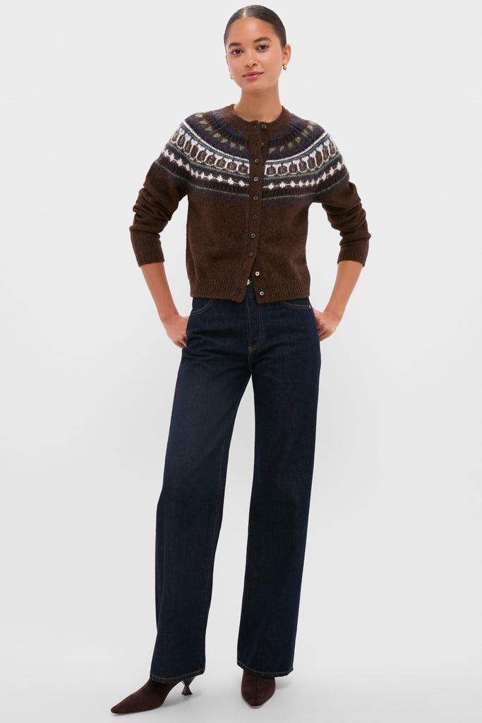 Model wearing the Juno Annina Straight Leg jeans with a classic high-rise cut, paired with a chic Fair Isle cardigan and deep brown suede ankle boots for an effortless, high-end look.