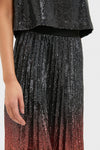 Ombre Sequin Bleeker Maxi Skirt, a classic and high-end piece, showcases an effortless transition of sparkling sequins, offering a fun twist to any wardrobe.