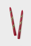 Holiday Hand Painted Taper Candles (Set of 2) featuring classic, effortless holiday wreath motifs, perfect for adding a high-end, fun touch to any festive setting.