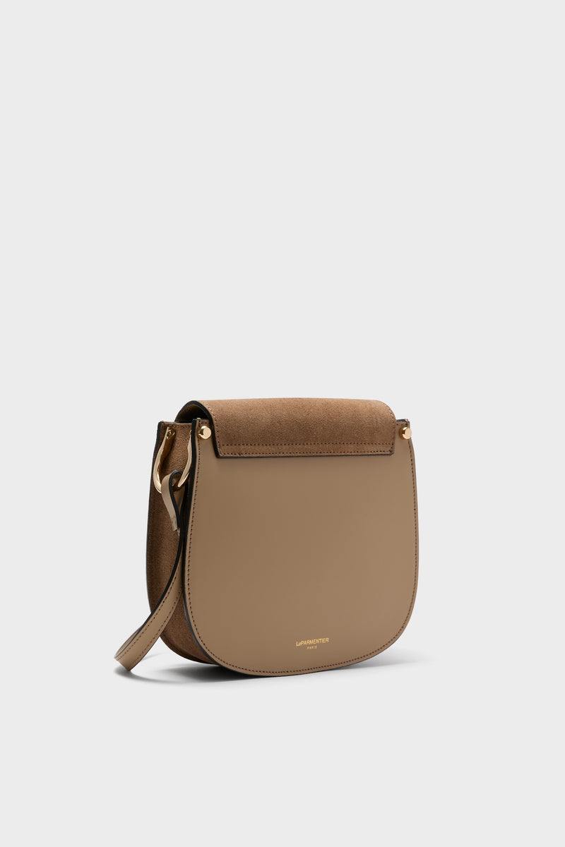 Taupe Agave Shoulder Bag: A classic, high-end saddle-style crossbody with effortless suede and leather texture, featuring gold-tone hardware and Le Parmentier Paris embossing. Perfectly fun and versatile.