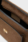 Taupe Agave Shoulder Bag: A classic, high-end suede handbag with gold-tone hardware and an effortless design featuring a push-lock clasp and adjustable strap.