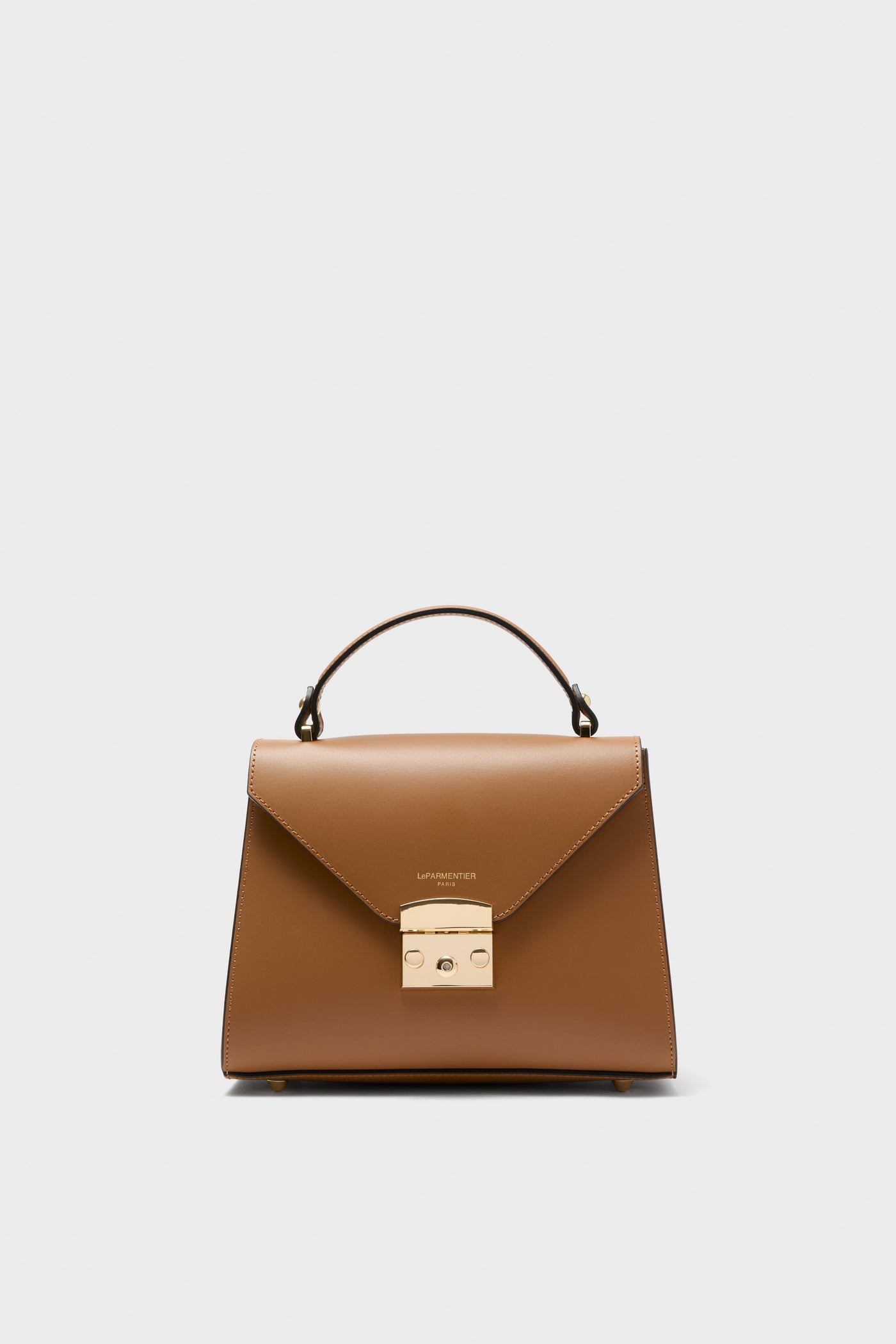 Caramel Peggy Top Handle Satchel Bag in tan leather with gold-tone hardware, offering a classic, high-end look. Features include a detachable strap and multiple pockets.