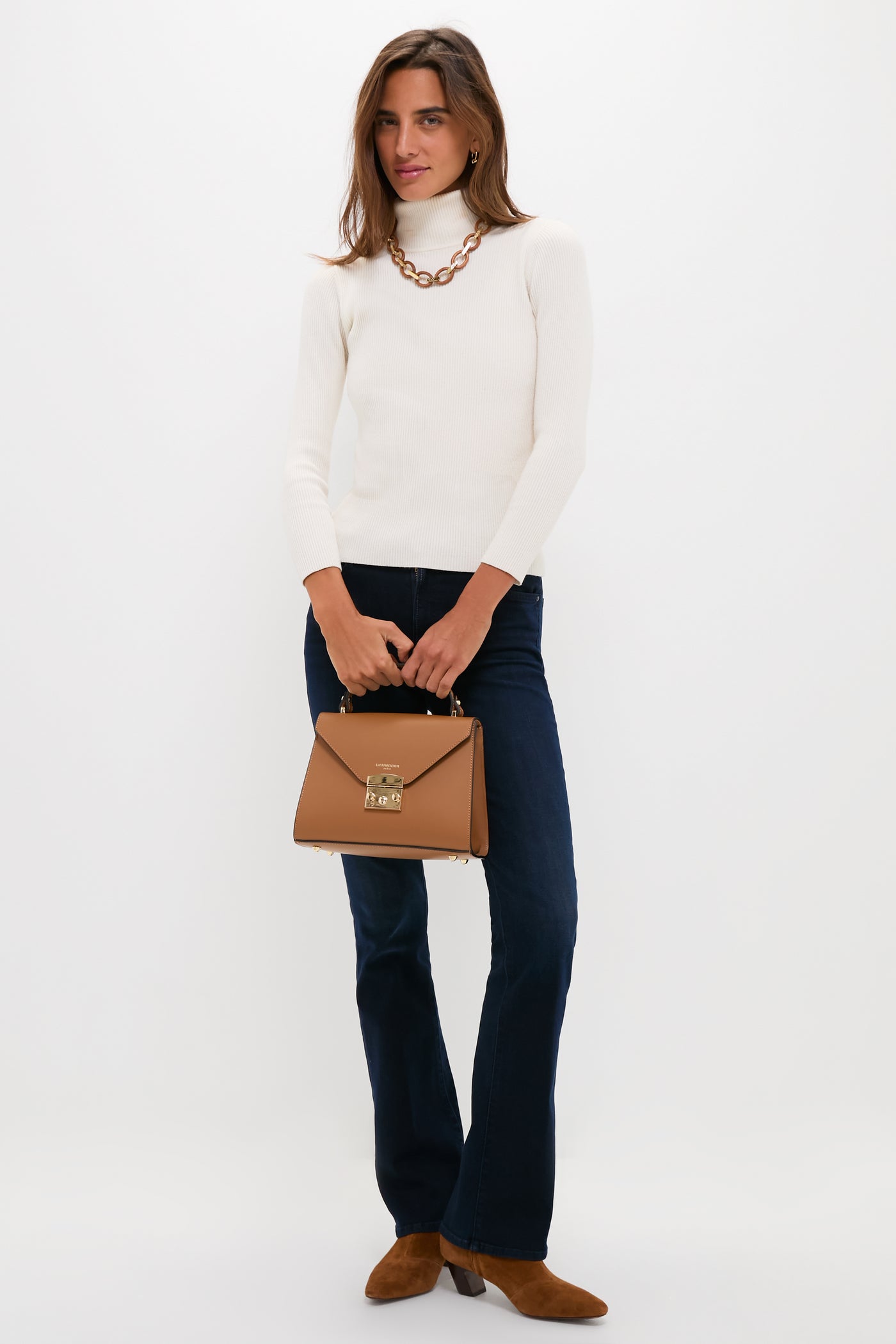 Caramel Peggy Top Handle Satchel Bag with gold-tone clasp, embodying classic, high-end style. Effortless and fun accessory, perfect for any occasion.