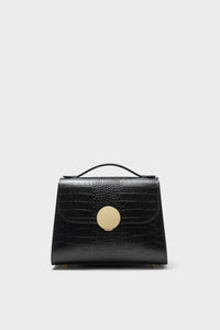 Black Bombo Croco Top Handle Satchel Bag in glossy leather, featuring a crocodile texture, gold-tone clasp, and trapezoidal shape, exudes classic and effortless high-end style.