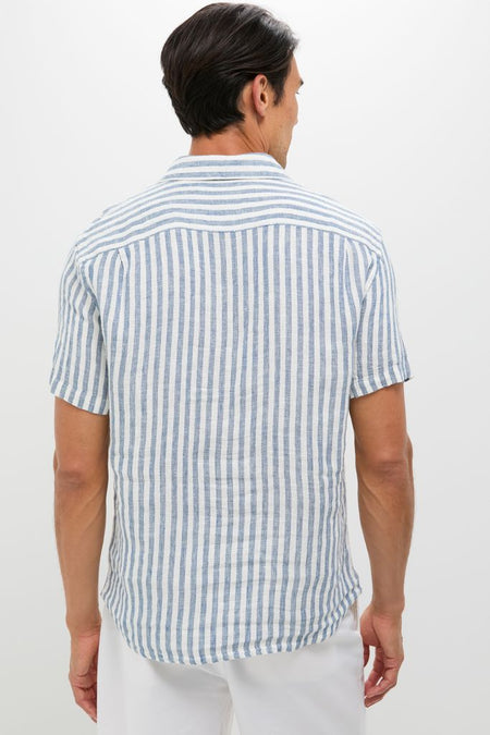 Back view of a man in an Ivory Stripe Short Sleeve Palma Linen Shirt, embodying classic and effortless style, perfect for a fun, high-end summer look.