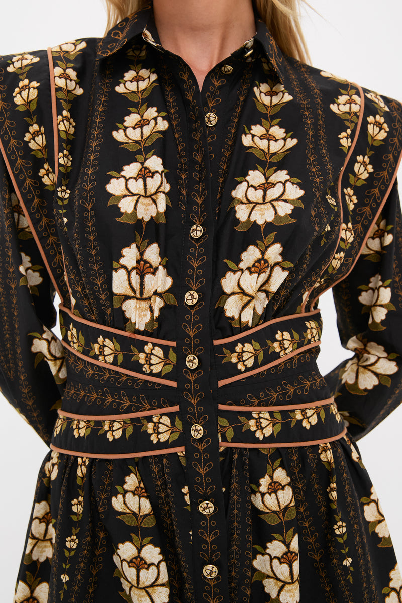 Black Embroidered Flowers Topstitching Long Sleeve Mini Dress with a classic floral print, effortless waist-cinching tan piping, and fun statement shoulders, offering a high-end, chic look.