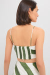 Model in Green Stripe Nature Top; classic, effortless two-piece with spaghetti straps, smocked back, and zipper, styled for a fun, high-end look.