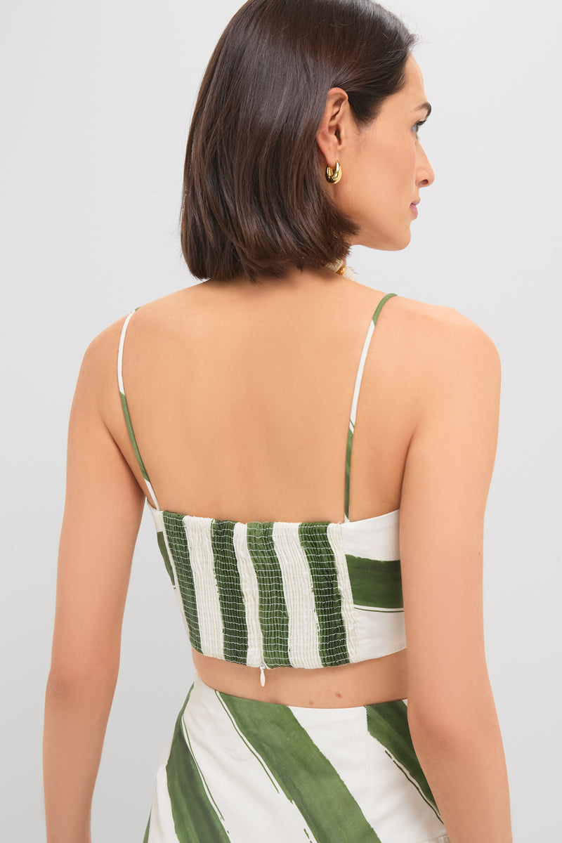 Model in Green Stripe Nature Top; classic, effortless two-piece with spaghetti straps, smocked back, and zipper, styled for a fun, high-end look.