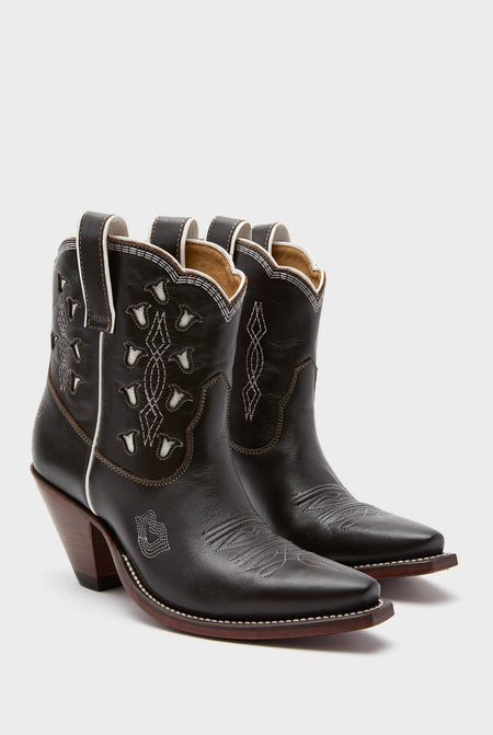 Chocolate and White Low Bright Boots: Classic black leather Western ankle boots with pointed toes, effortless white stitching, side pulls, and fun tulip inlays. High-end style for confident wear.
