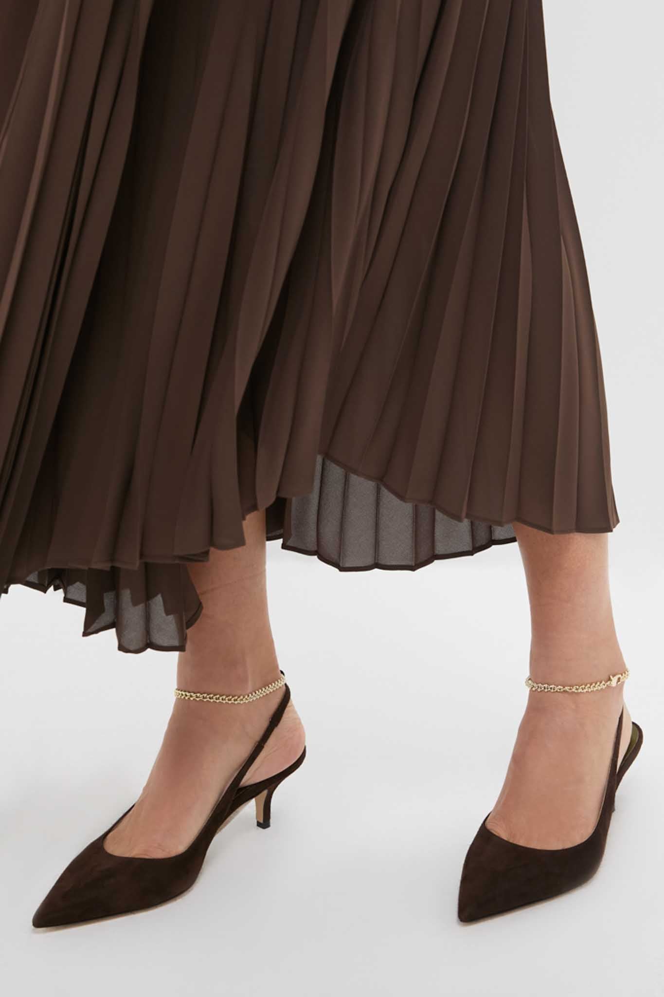 Classic Dark Brown Felicia Slingback Heels with pointed toes and removable gold ankle chains, offering an effortless, high-end style with a fun, relaxed vibe.