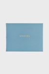 Graphic Image blue leather guest book with "GUESTS" embossed in gold on the cover—ideal for weddings or as a personalized leather gift.