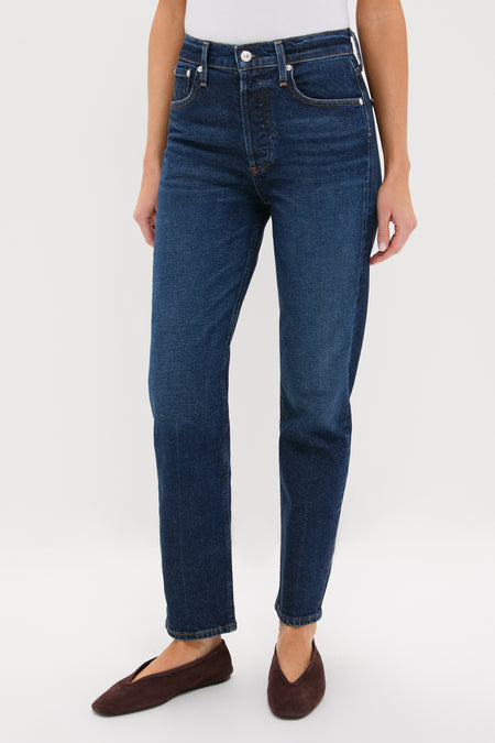 Model wears Sutherland Blaine Jean, classic high-rise, straight-leg denim with a clean hem. Effortless and high-end, perfect for a fun, versatile wardrobe.