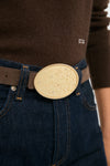 Gold Celeste Buckle—a classic, high-end accessory featuring a textured gold oval design with crystal stars, effortlessly elevating any outfit with fun sophistication.