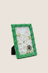 Classic 4x6 Countryside Green Frame, resembling bamboo, offers effortless elegance and fun versatility for high-end decor, standing with an easel for vertical or horizontal display.