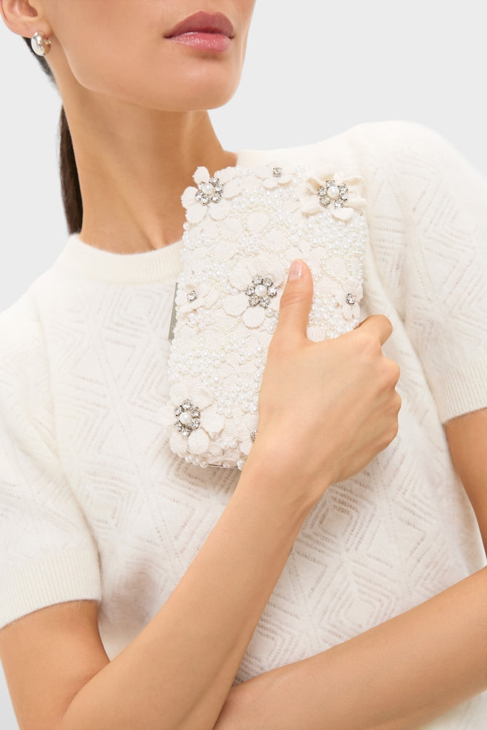 Ivory Beth Encrusted Clutch, a high-end bag with classic pearl and crystal detailing, exudes effortless elegance, perfect for fun, formal occasions.