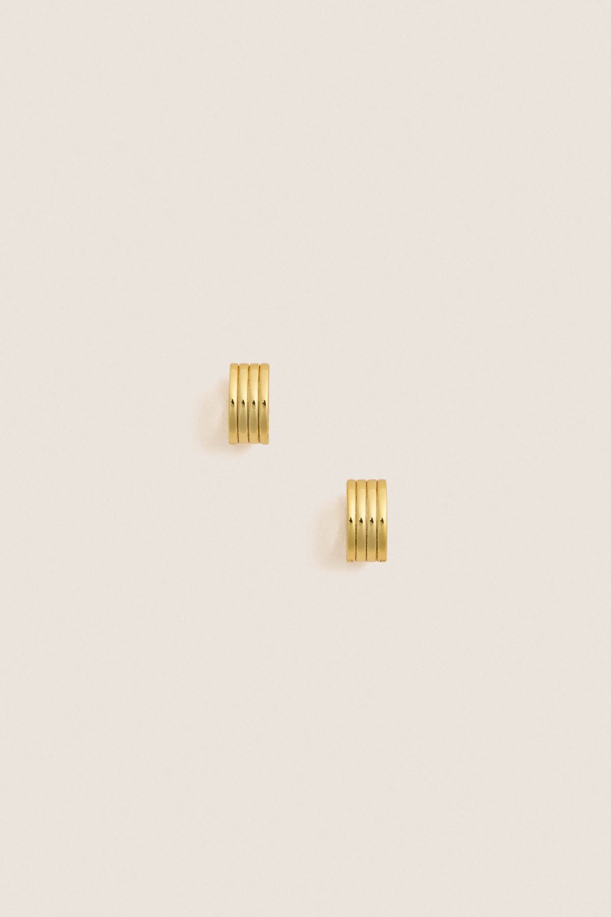 Gold Infinity Huggie Earrings
