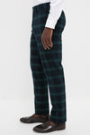 Blackwatch Tartan Stretch Twill Harbor Pants (34 Inseam) feature a classic, effortless design in a high-end tartan plaid, paired stylishly with dark brown loafers.