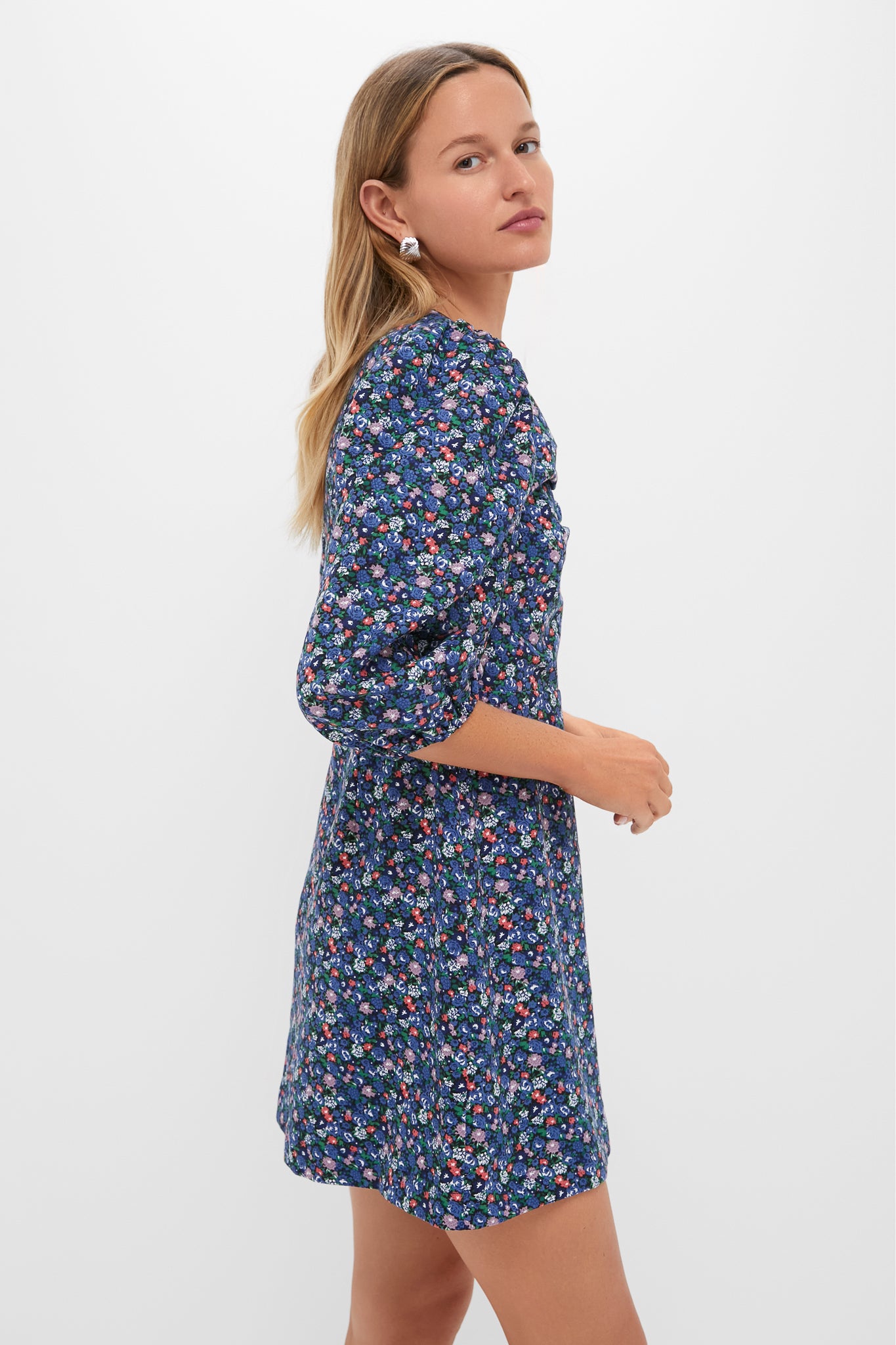 Classic and effortless, the Black & Navy Corduroy Floral Keyhole Moore Mini Dress exudes high-end charm, featuring a fun floral print and keyhole neckline, perfect for chic outings.