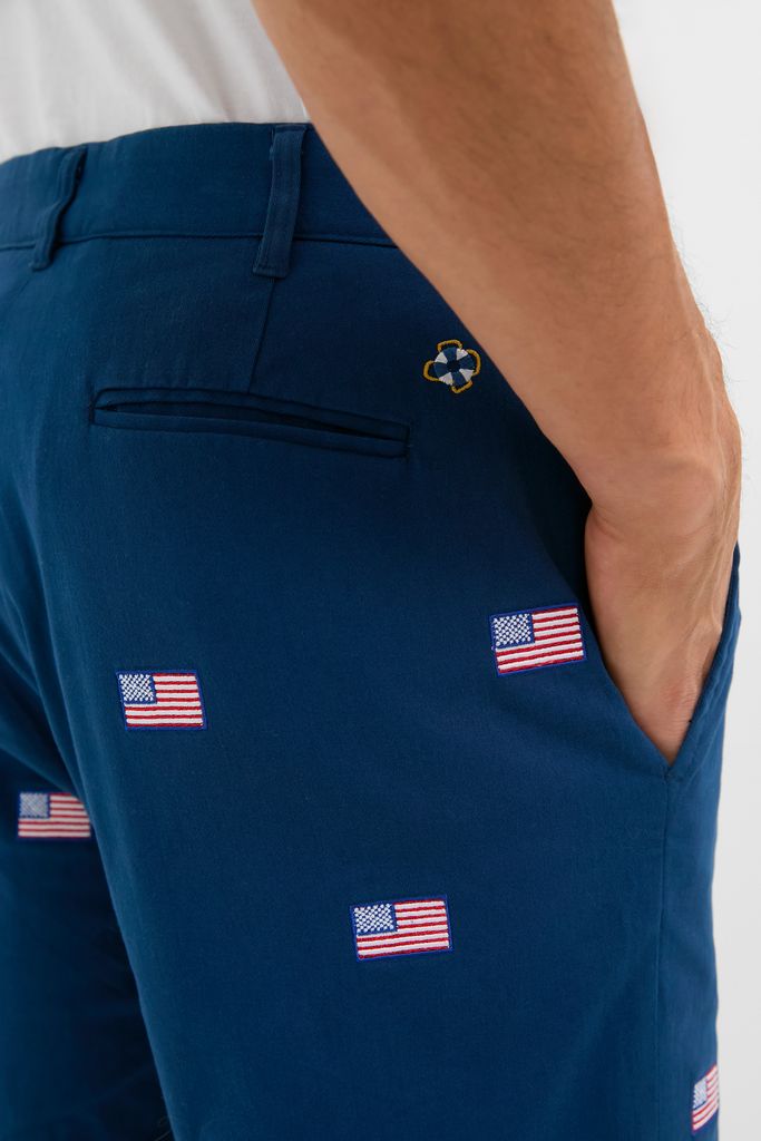 Navy American Flag Embroidered Stretch Twill Cisco Shorts, classic and effortless, featuring embroidered flags and a life-ring motif, perfect for fun, high-end summer activities.