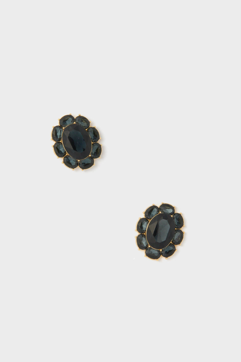 Tuckernuck Jewelry's vintage-inspired oval black gemstone studs feature gold plating and are accented with smaller black stones in elegant gold settings.