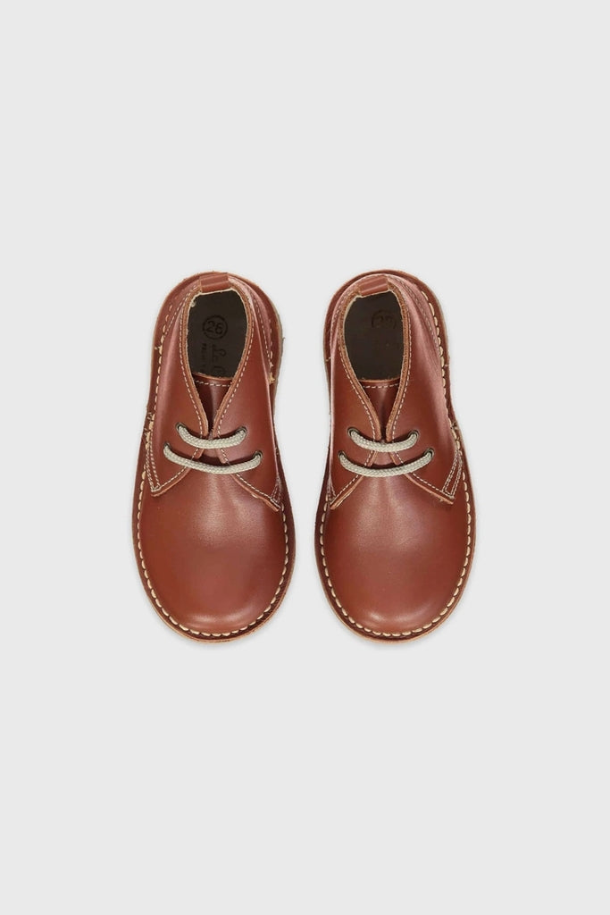 Dark Tan Leather Kids Desert Boots, classic lace-up design with contrast stitching, crafted from soft Nappa leather, embodying effortless style and fun versatility for active, high-end children's footwear.