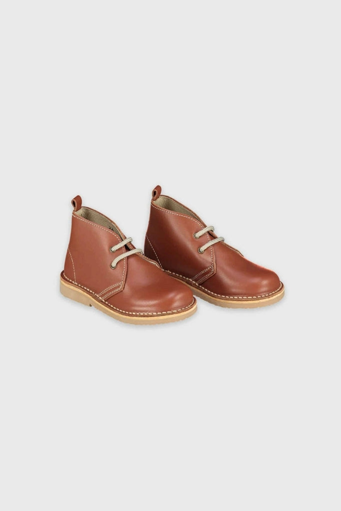 Dark Tan Leather Kids Desert Boots in soft Nappa leather with light laces and rubber sole, offering classic, fun, and effortless style for active children.