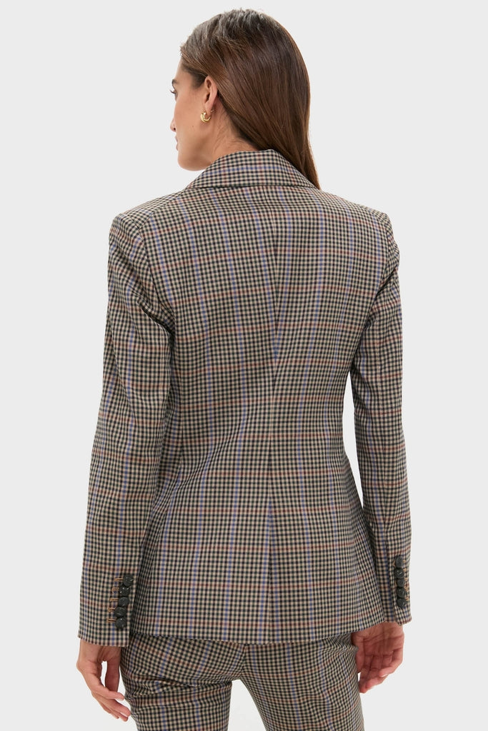 Rear view of a woman in a classic, high-end Russet Multi Claude Dickey Jacket, showcasing effortless style with its tailored fit and subtle shoulder structure.