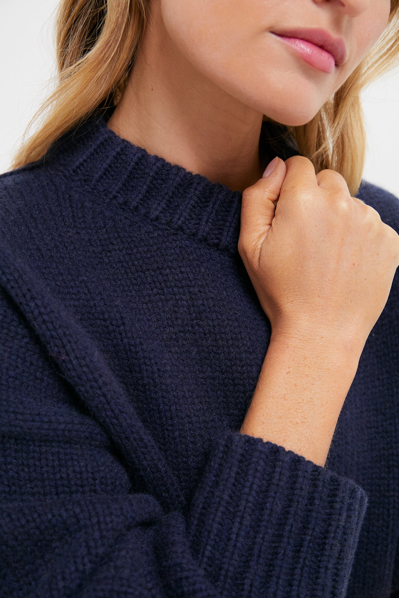 Navy Genevieve Cashmere Wool Blend Crewneck Sweater featuring a classic chunky knit, ribbed finishes, and a boxy fit, exuding effortless, high-end style.
