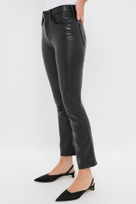 Exclusive Black Faux Leather The Insider Flood pants with a classic fit, effortless high-rise, and slight ankle flare, paired with sleek, fun, high-end kitten-heel shoes.