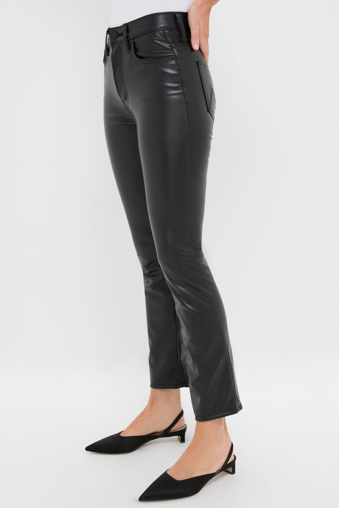 Exclusive Black Faux Leather The Insider Flood pants with a classic fit, effortless high-rise, and slight ankle flare, paired with sleek, fun, high-end kitten-heel shoes.