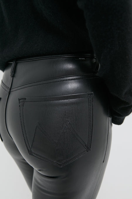 Exclusive Black Faux Leather The Insider Flood pants showcase a classic, high-end fit with zigzag pocket stitching, delivering an effortless and fun style suitable for any occasion.