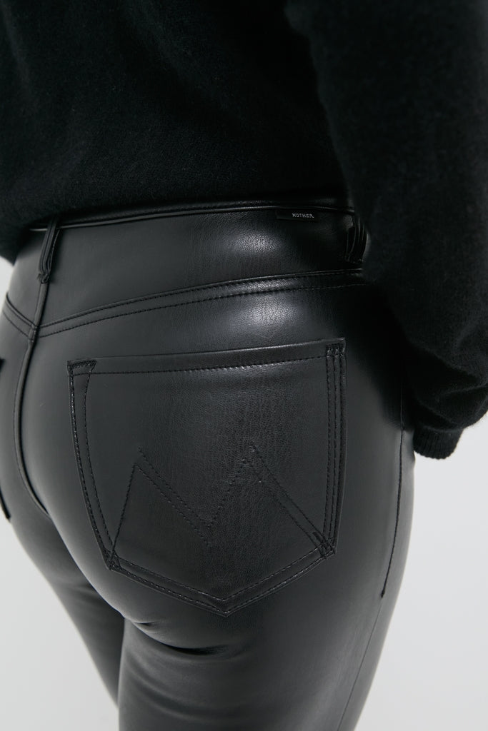 Exclusive Black Faux Leather The Insider Flood pants showcase a classic, high-end fit with zigzag pocket stitching, delivering an effortless and fun style suitable for any occasion.