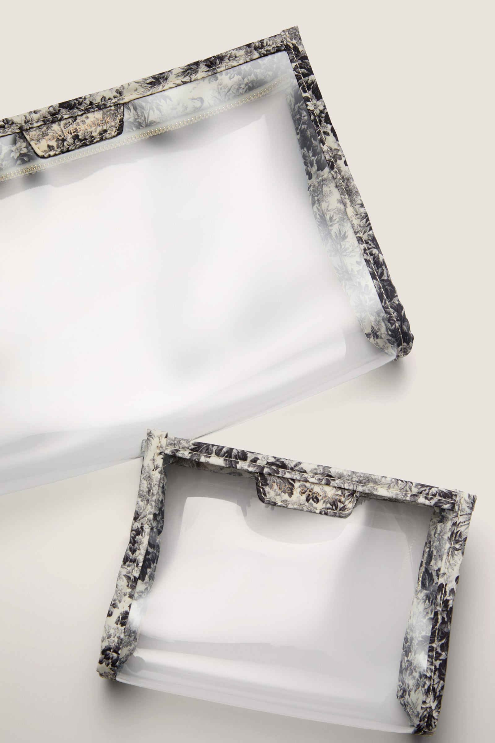 Noir Cypress Toile PVC Wide Large Pouch featuring classic toile trim and gold zipper; effortlessly stylish for travel or home use. Fun, high-end storage solution.