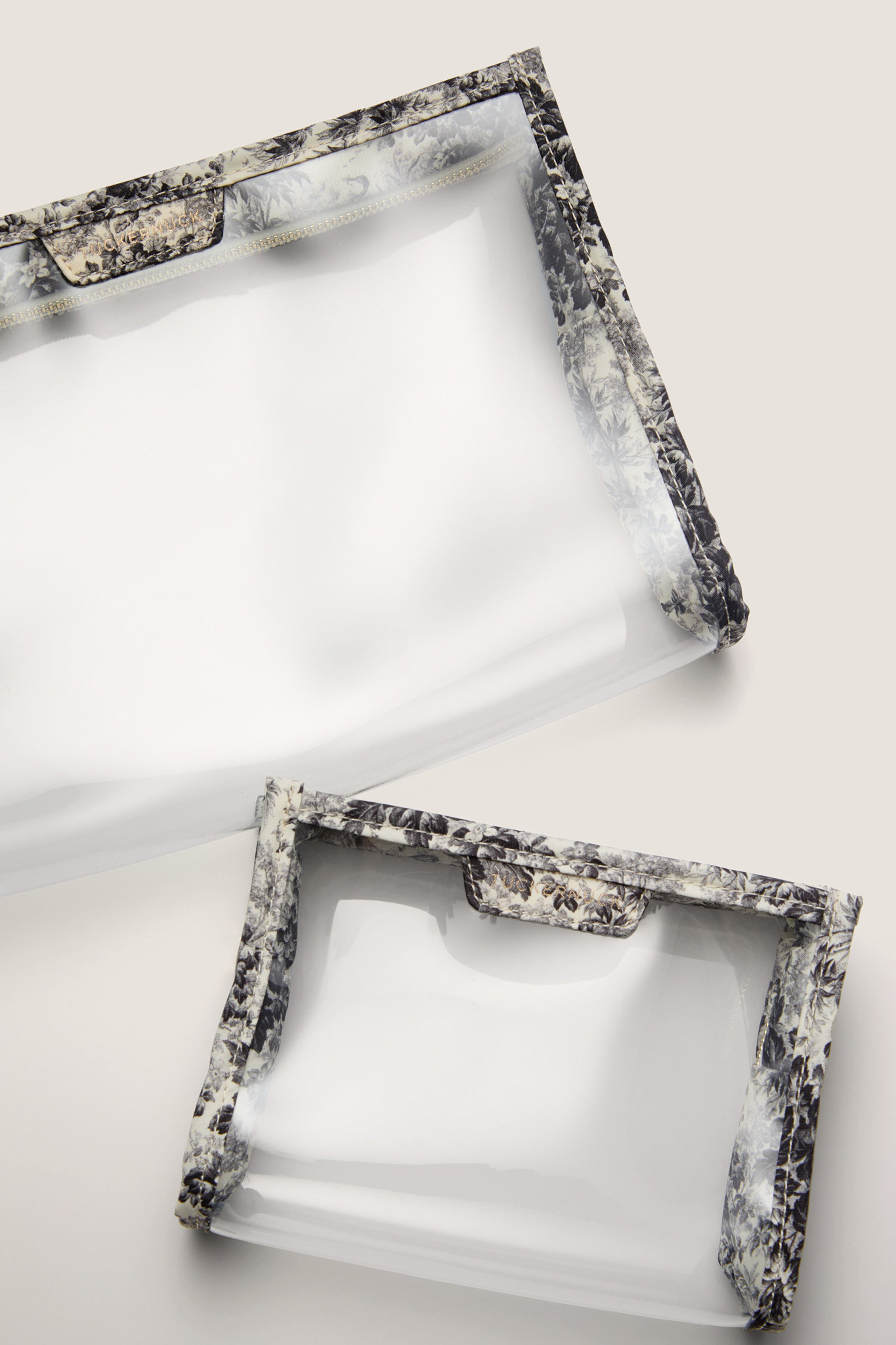 Noir Cypress Toile PVC Wide Large Pouch featuring classic toile trim and gold zipper; effortlessly stylish for travel or home use. Fun, high-end storage solution.