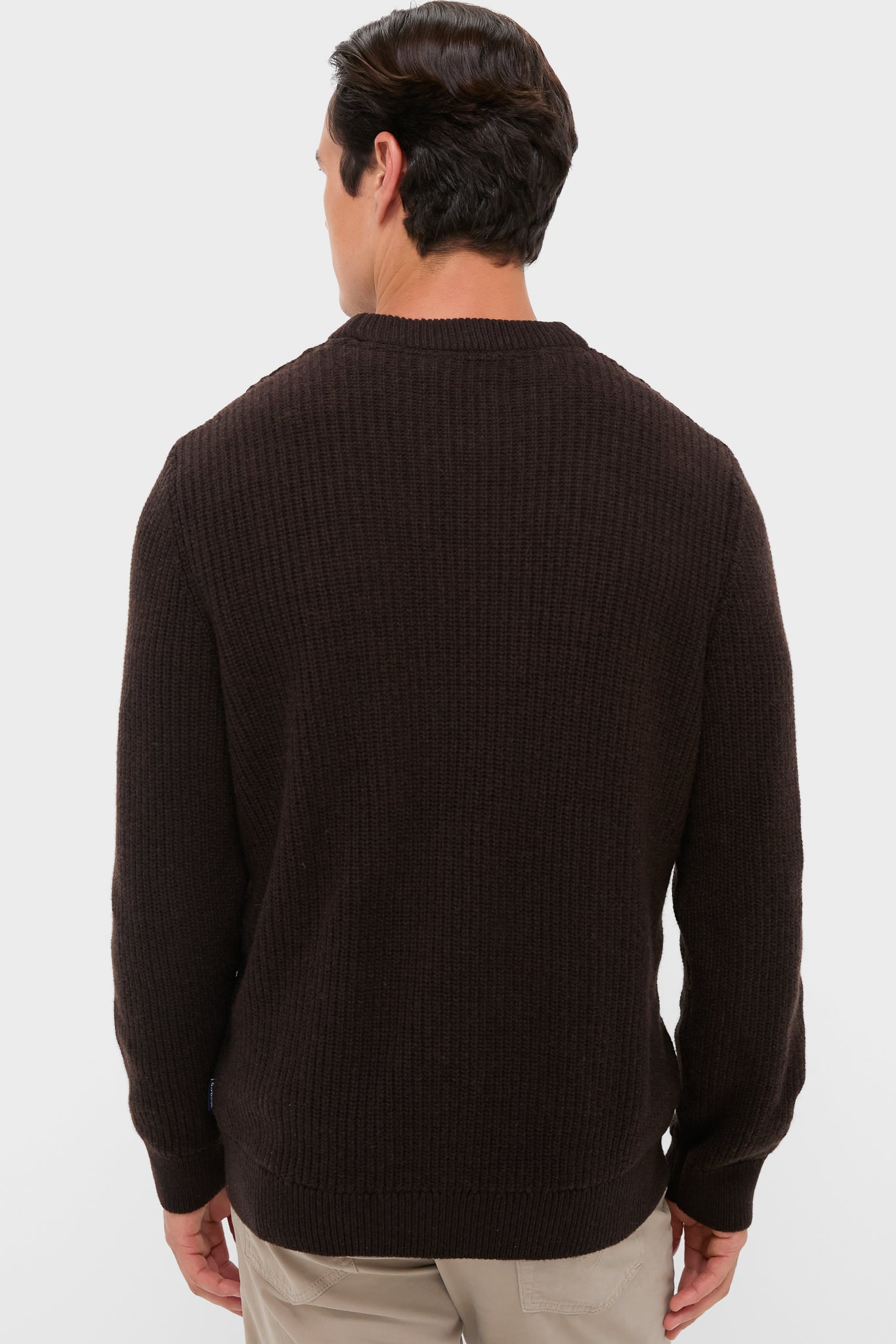 The Dark Oak Cleveland Crew Neck Sweater showcases a classic, waffle-knit design, embodying effortless style and warmth, perfect for a high-end, fun wardrobe addition.