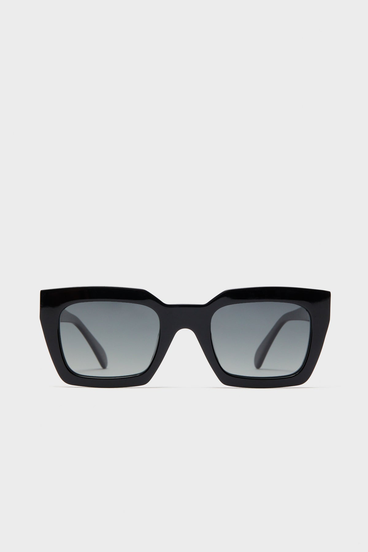 Oversized square sunglasses by Anine Bing featuring dark tinted lenses and polarized UV400 protection.