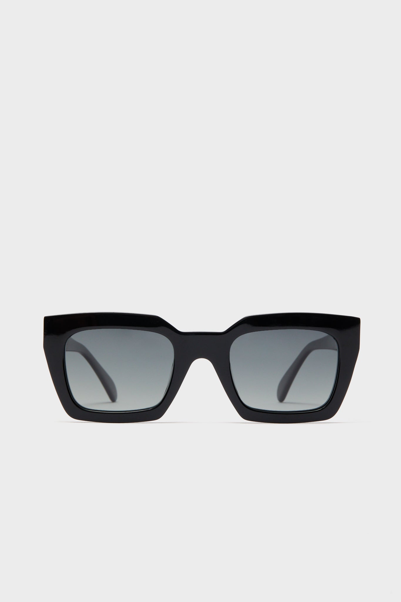 Oversized square sunglasses by Anine Bing featuring dark tinted lenses and polarized UV400 protection.