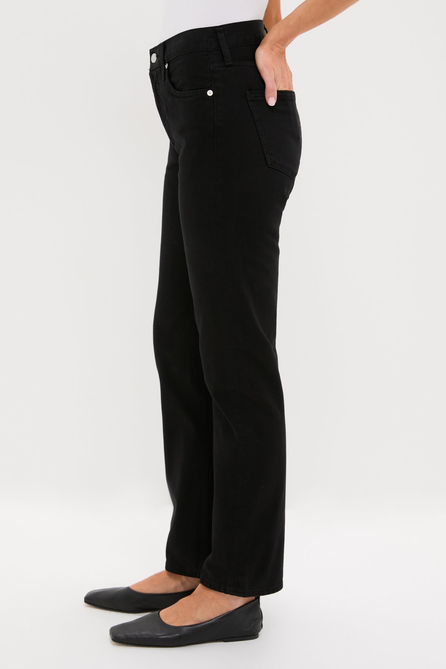 Solid Black Blaine Jean showcases a classic, high-rise, straight-leg cut, offering an effortless and high-end look with a timeless, fun appeal.