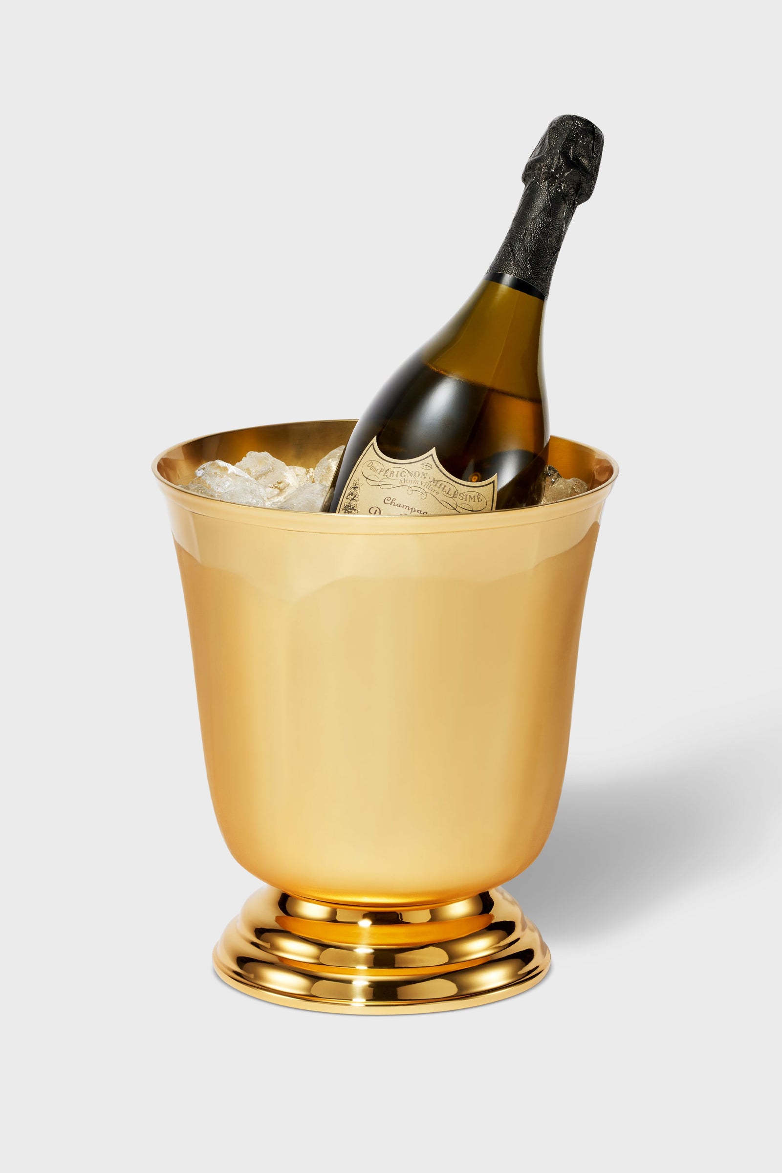 Vita Large Ice Bucket: A classic, high-end gold-tone bucket with a faceted, contemporary design, chilling a Champagne bottle. Perfect for an effortless, fun home bar experience.
