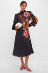 Woman modeling the Black Chenille Flowers Midi Dress, featuring a classic design with bold floral appliqués, scalloped trim, and blouson sleeves, embodying effortless elegance and high-end style.
