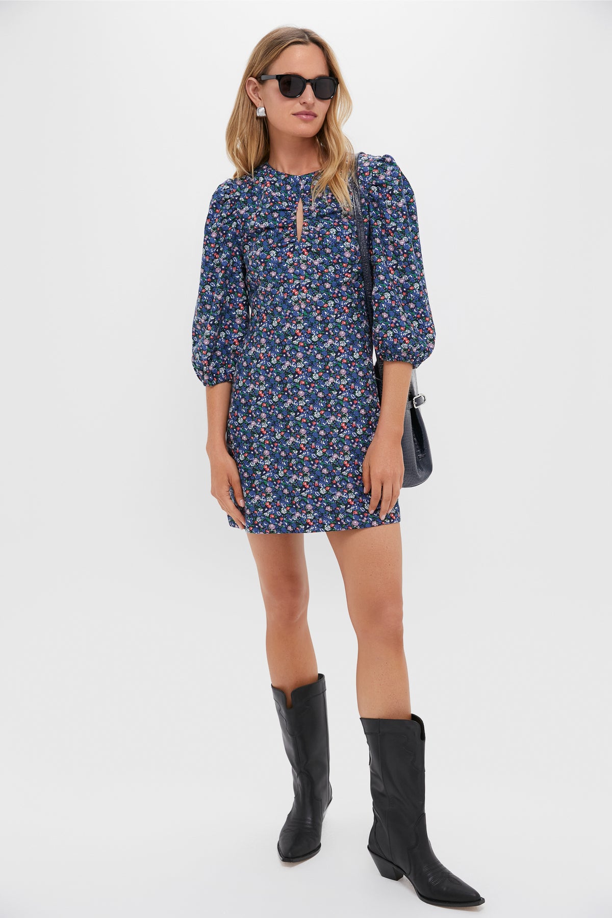 Model wearing the Black & Navy Corduroy Floral Keyhole Moore Mini Dress, featuring three-quarter puff sleeves and paired with black cowboy boots, exuding effortless classic style.