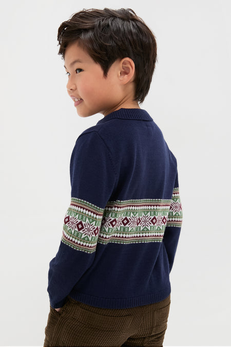 Young boy smiling in a classic, high-end Fairisle Collar Sweater, effortlessly styled with brown corduroy pants, capturing a fun and timeless look.