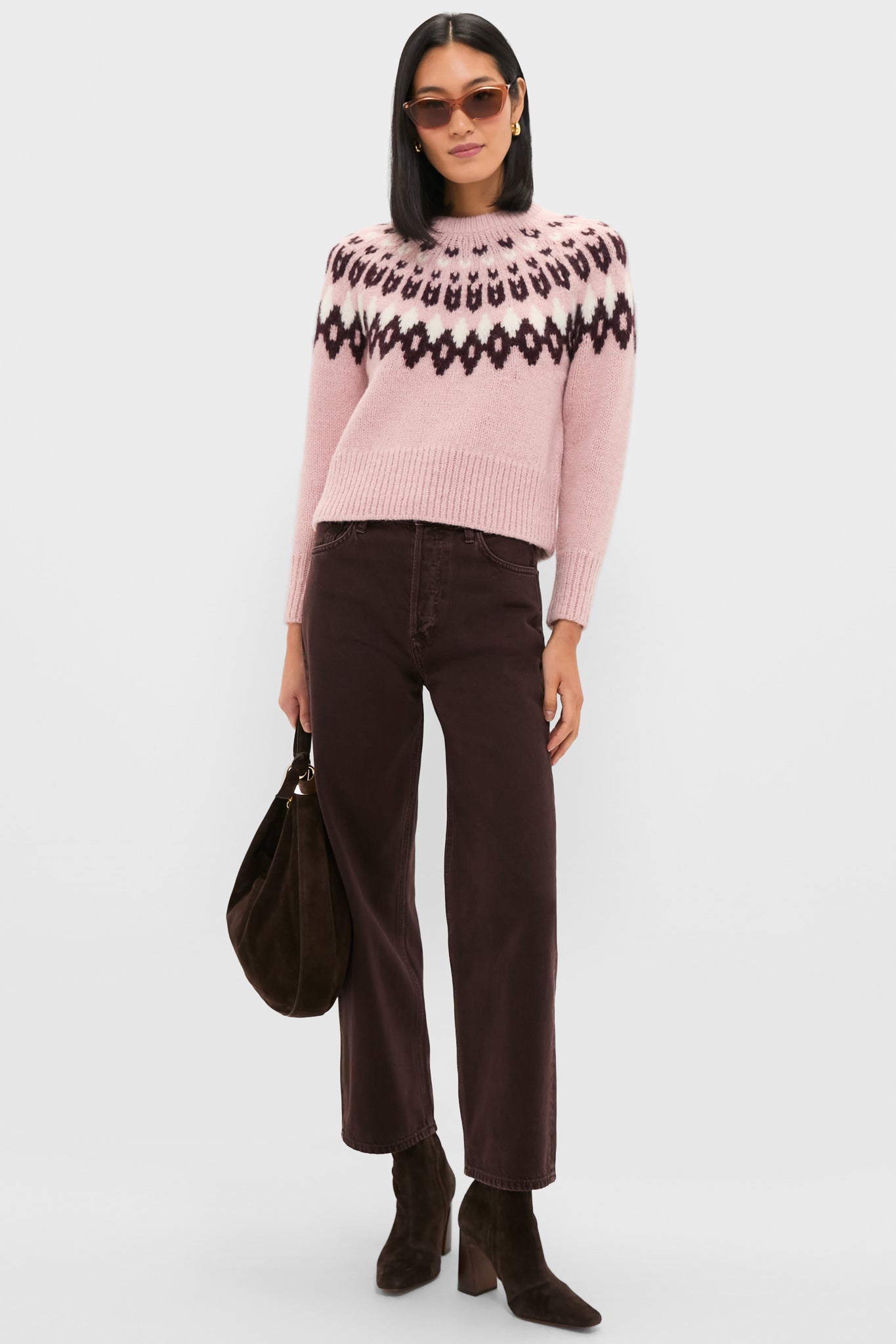 Woman wearing Shiny Transparent Amber Brown Sunglasses with thin frame, chic brown outfit, and sleek bob, capturing a classic, effortless style perfect for high-end, fun occasions.