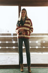 American Flag Lindsey Cardigan exudes classic, effortless style with its Americana knit and leather buttons, perfect for a fun, high-end winter look.