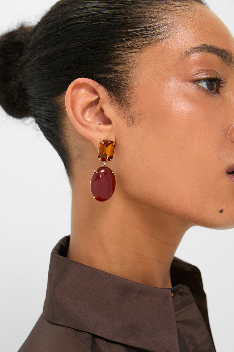 Carnelian Xiomara Earrings exude effortless sophistication with amber and red stones in gold-tone, creating a classic, high-end look perfect for any occasion.