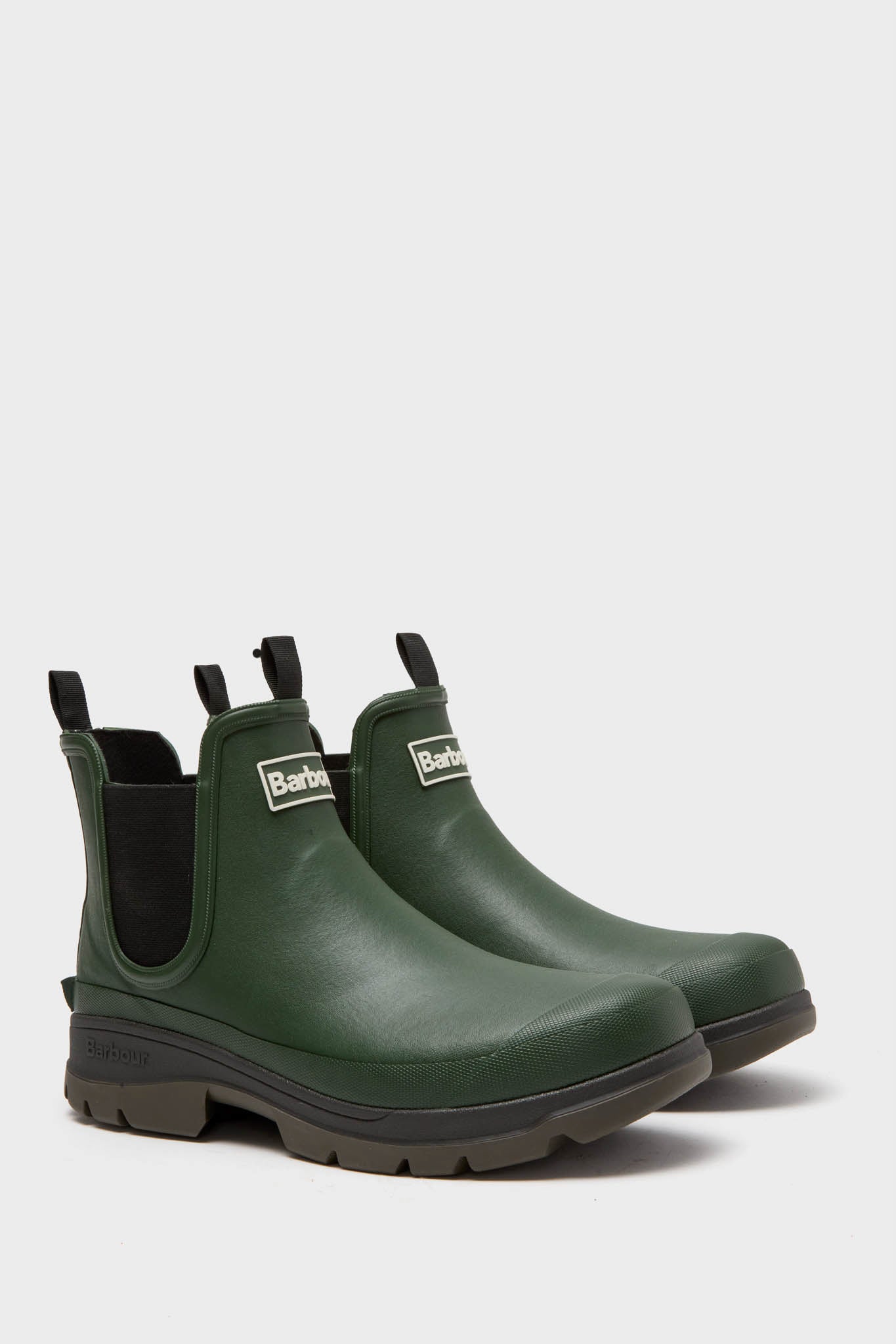 Olive Nimbus Chelsea Welly Boots: Classic, effortless rain boots with elastic panels, pull tabs, and chunky soles, embodying fun and high-end style for easy, confident dressing.