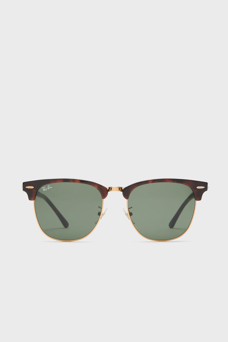 Front view of Ray-Ban Clubmaster tortoiseshell sunglasses with gold accents and green lenses, featuring the Ray-Ban logo on the upper left lens.
